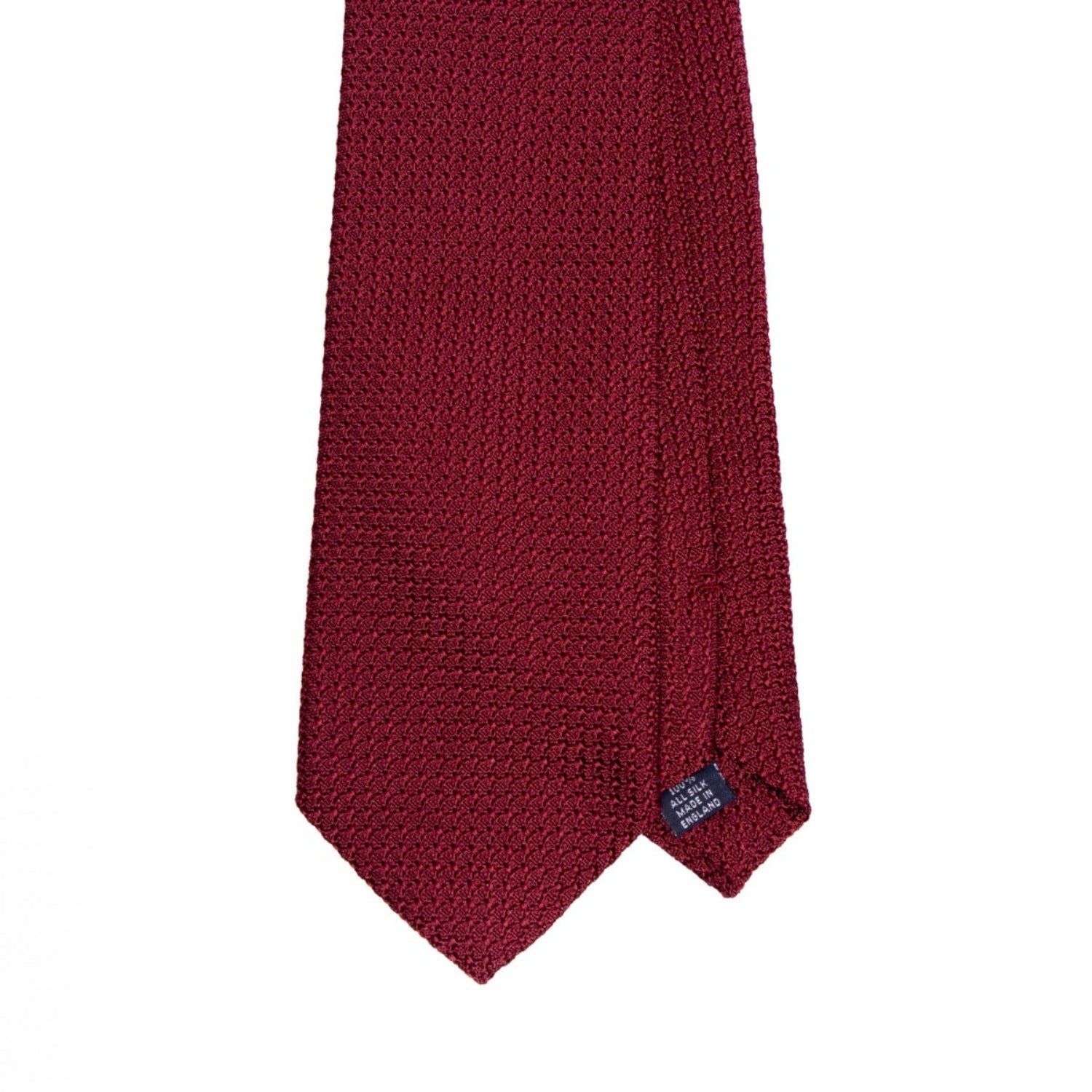 A Sovereign Grade Grenadine Grossa Ruby Tie showcasing quality on a white background by KirbyAllison.com.