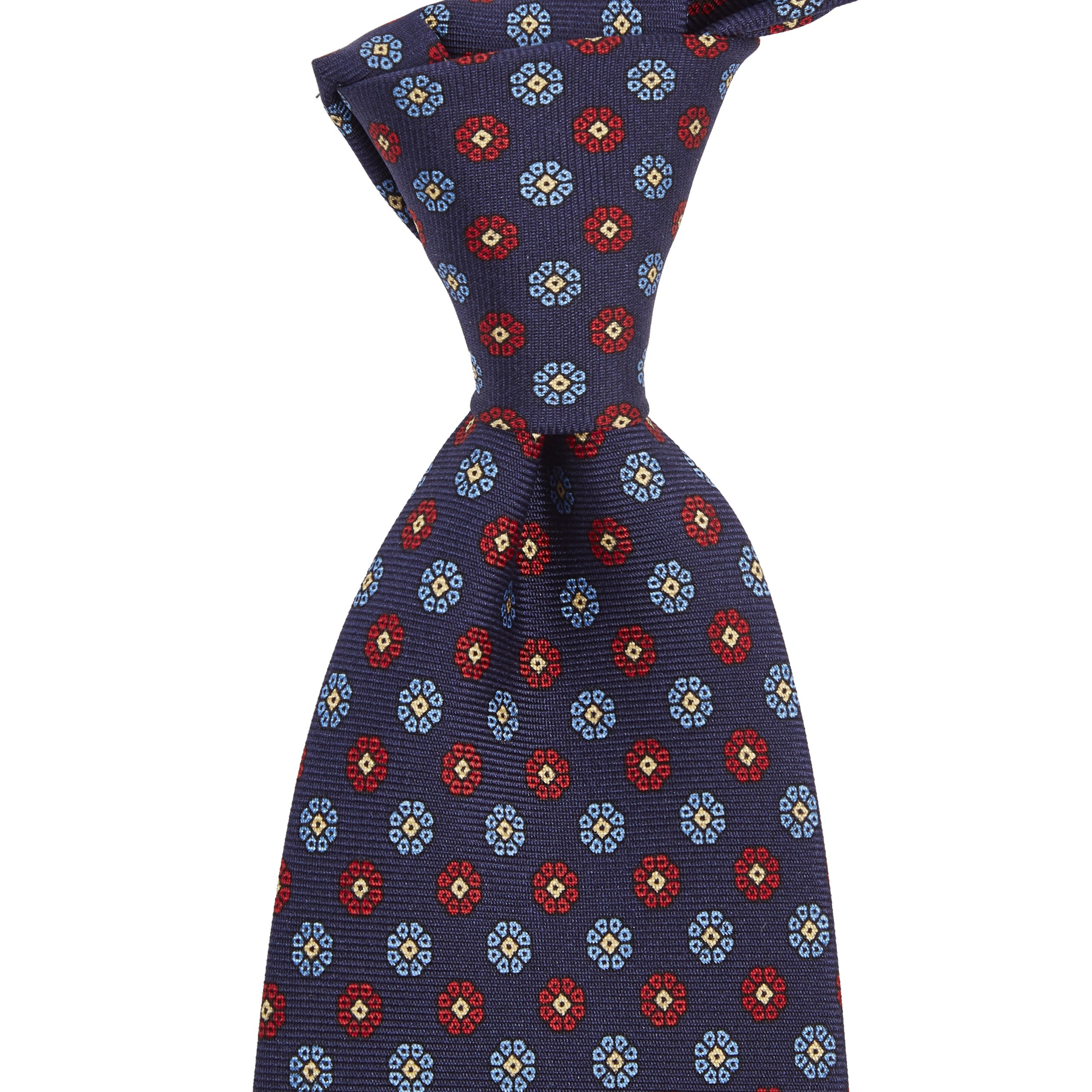 A Sovereign Grade Macclesfield Corn Floral Motif Tie with blue flowers on it from KirbyAllison.com.