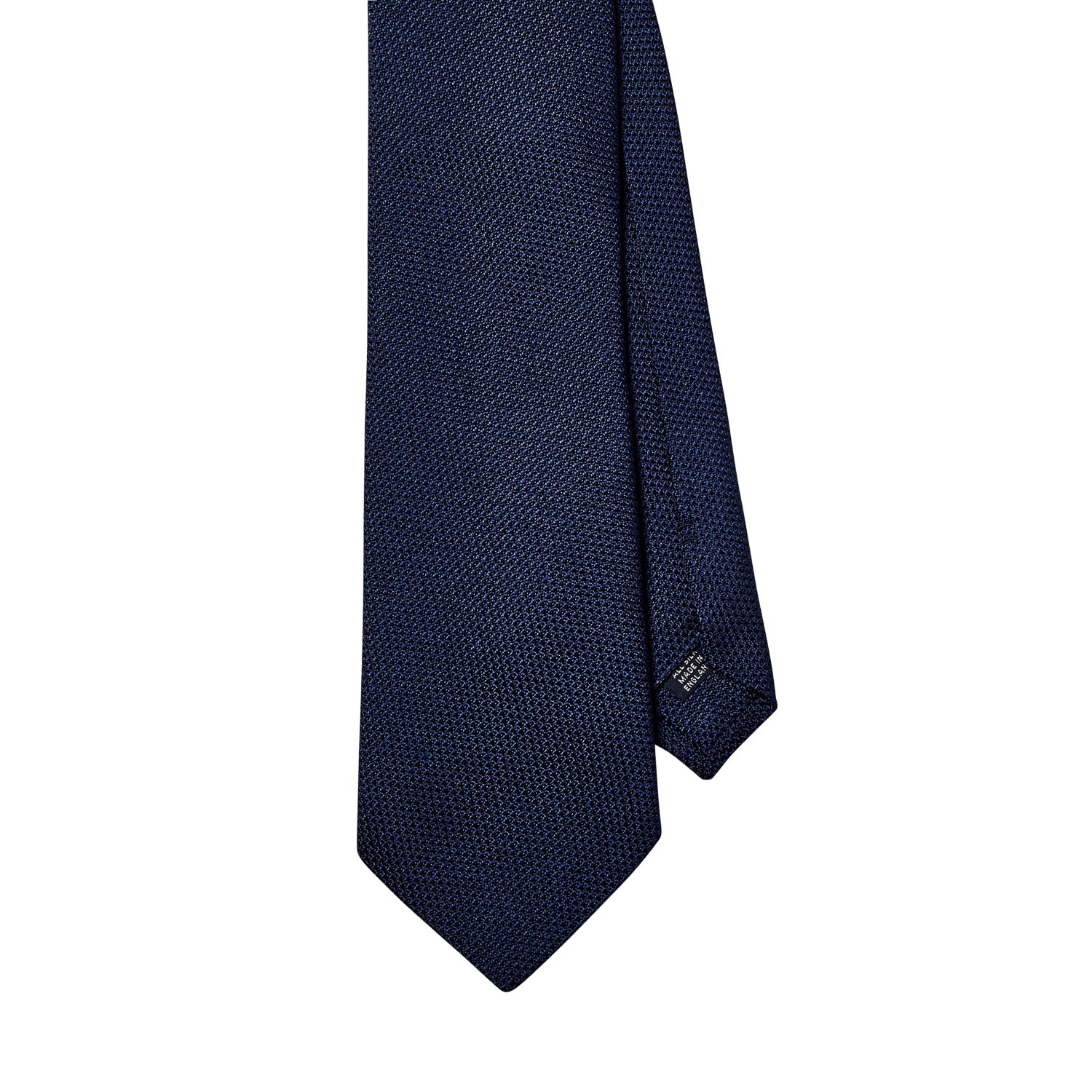 A Sovereign Grade Grenadine Fina Dark Navy Tie by KirbyAllison.com on a white background showcasing United Kingdom craftsmanship.