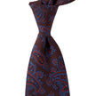 A high-quality, handmade Sovereign Grade Burgundy Ancient Madder Paisley Tie with brown and blue design on a white background, sold by KirbyAllison.com.