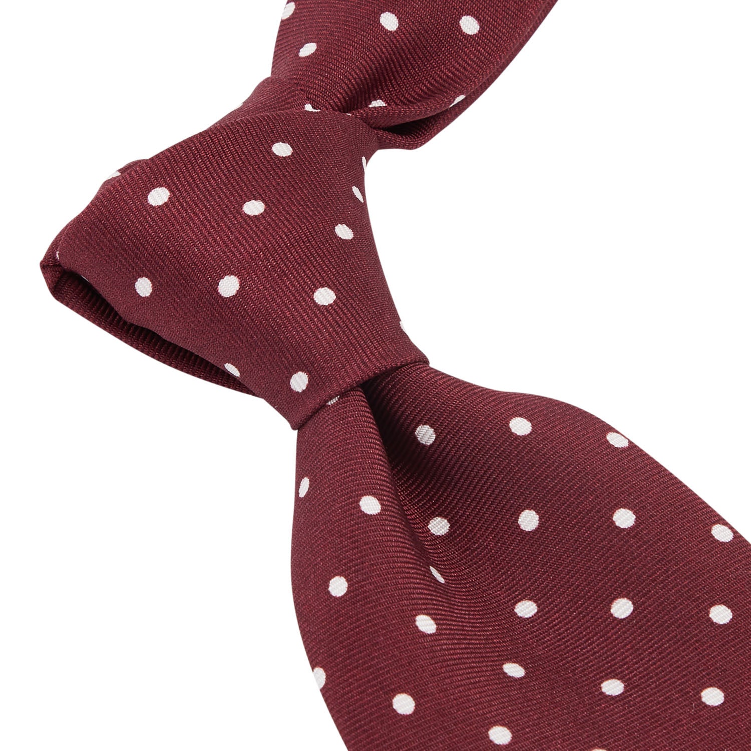 A Sovereign Grade Burgundy London Dot Printed Silk Tie by KirbyAllison.com on a white background showcasing craftsmanship.