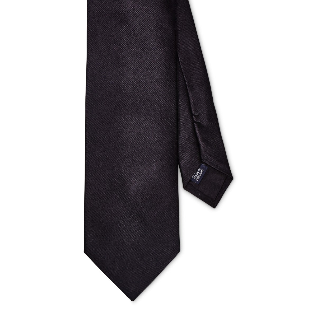 A handmade, Sovereign Grade Black Solid Satin Tie made of 100% English silk displayed against a white background, by KirbyAllison.com.