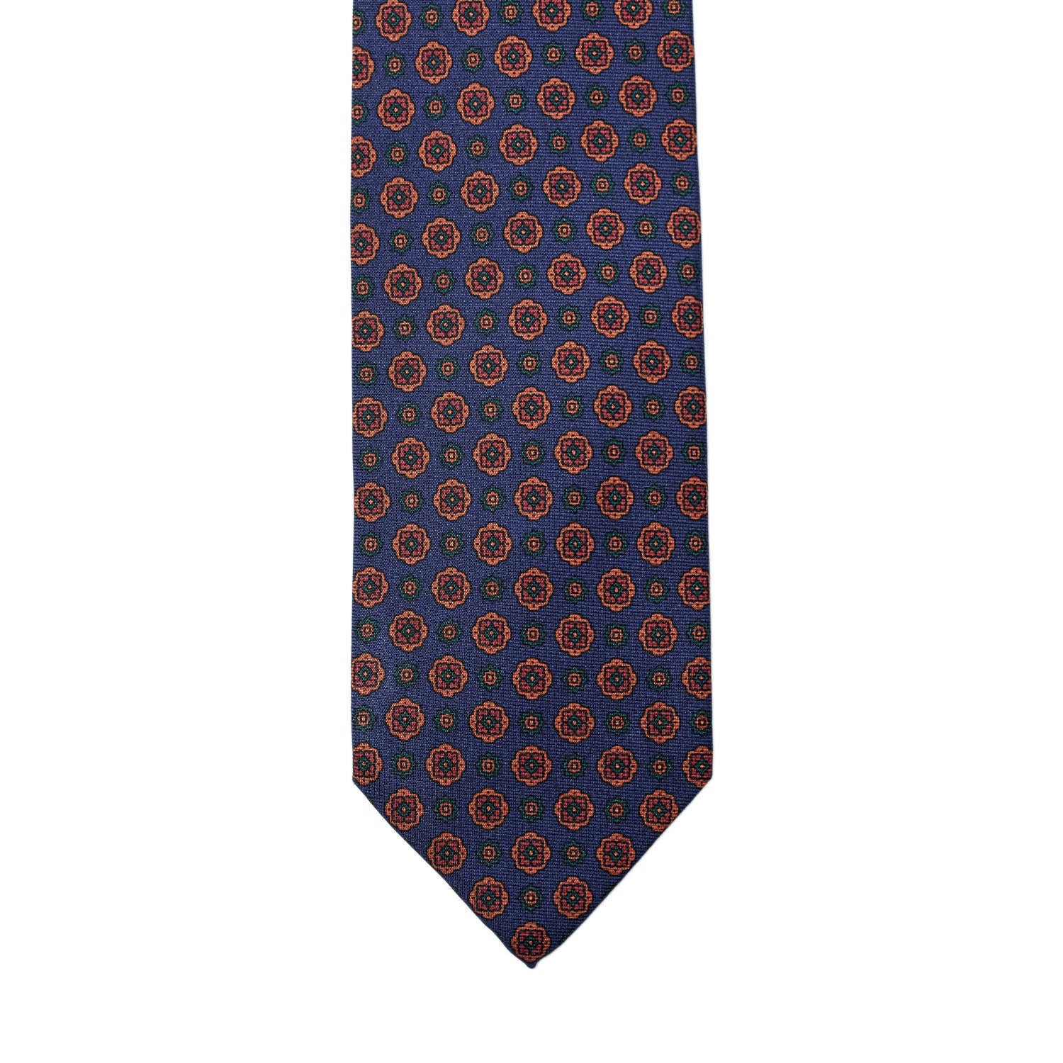 A KirbyAllison.com Sovereign Grade Navy Geometric Floral Ancient Madder Tie (150x8.5 cm) with a United Kingdom-inspired orange and blue pattern.