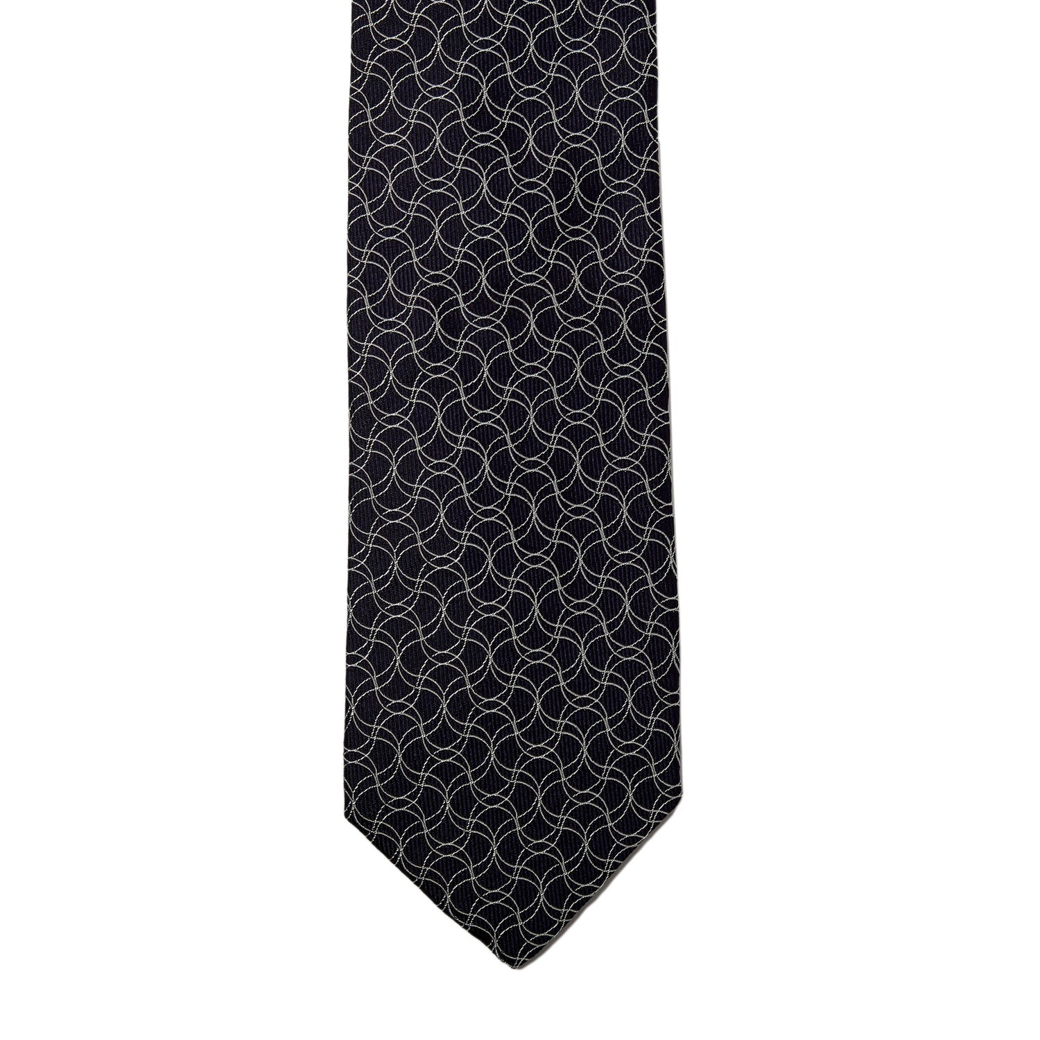 A KirbyAllison.com Sovereign Grade Navy and White Swirl Jacquard Tie with a geometric pattern.