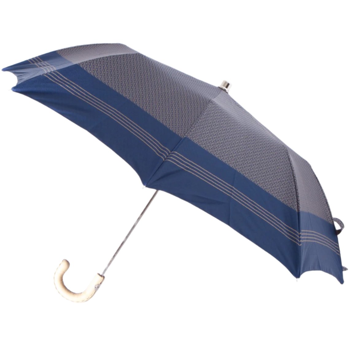 A Patterned Navy Travel Umbrella with Leather Handle by KirbyAllison.com, perfect for traveling in Milan, Italy.