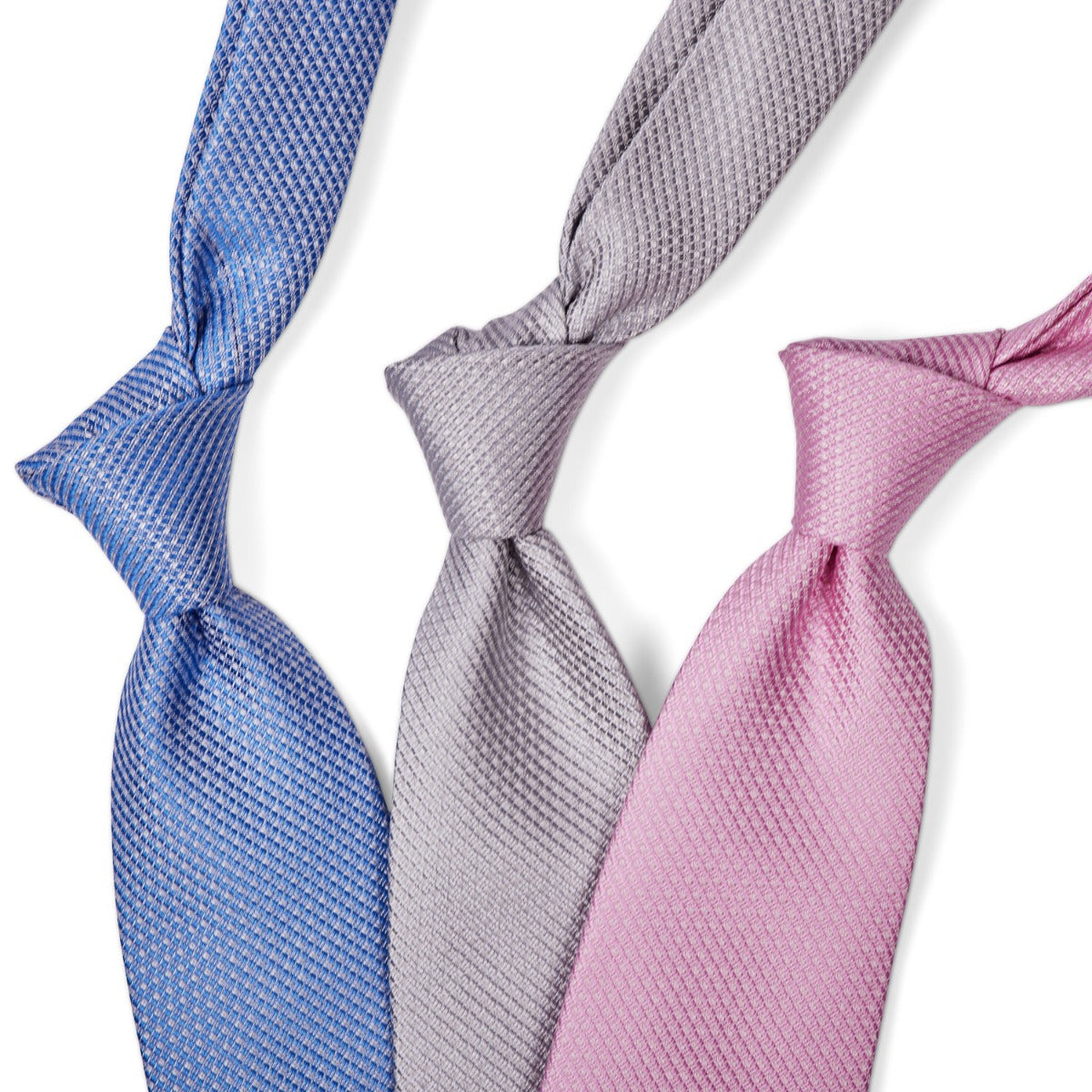 Three Sovereign Grade Pink Jacquard Mock Grenadine ties on a white background in the United Kingdom from KirbyAllison.com.