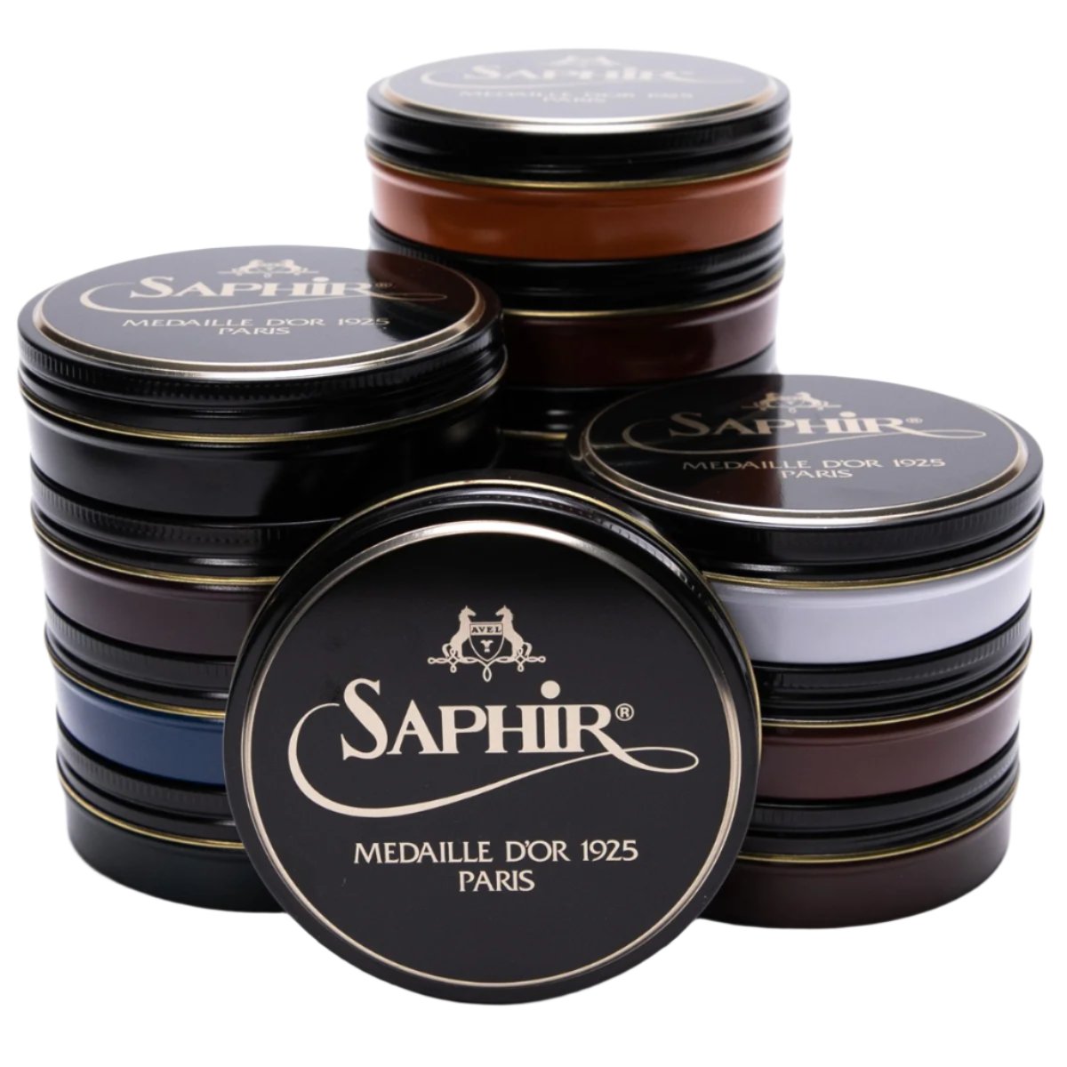 A group of tins with the word KirbyAllison.com on them, containing Saphir Pate de Luxe Wax Shoe Polish 100 ml for achieving a high-gloss shine.