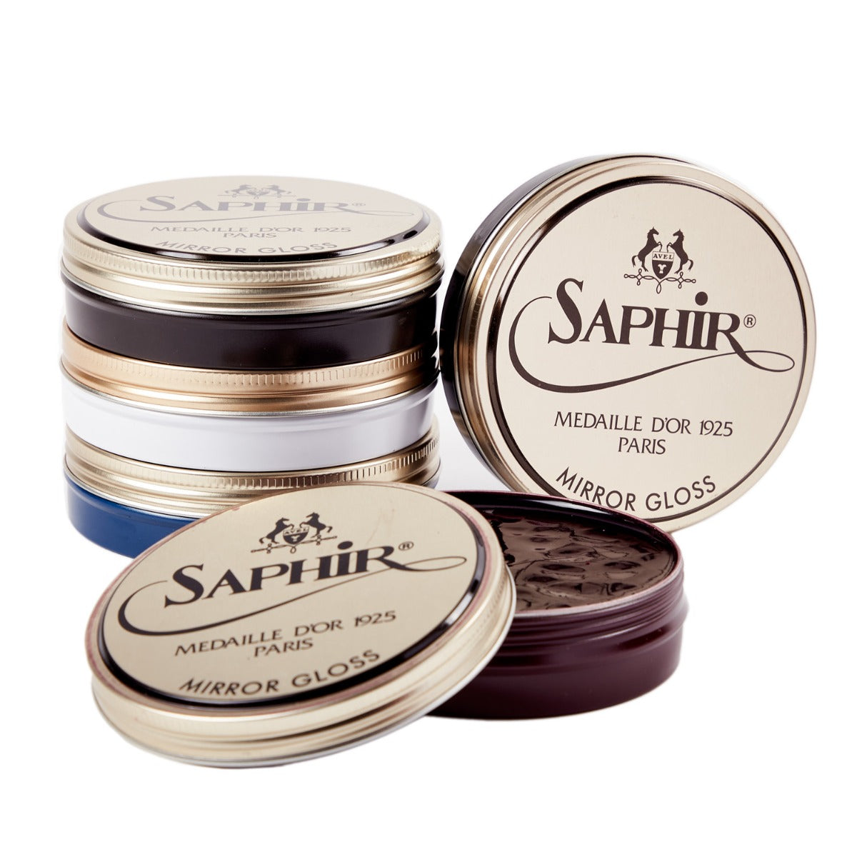 Four tins of KirbyAllison.com's Saphir Mirror Gloss Wax Polish.